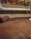 Crawl space drainage matting installed in a home in Santa Cruz