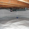 A heating duct extends along this sealed crawl space in Hayward.