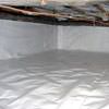 A crawl space vapor barrier has been installed on the walls and floors of this space in San Mateo.