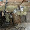 Crawl space insulation soaked with moisture and falling to the floor in Santa Cruz.