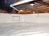 A crawl space moisture barrier installed in Burlingame