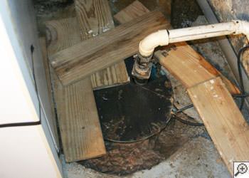 An ugly, clogged sump pump system in Oakland, California